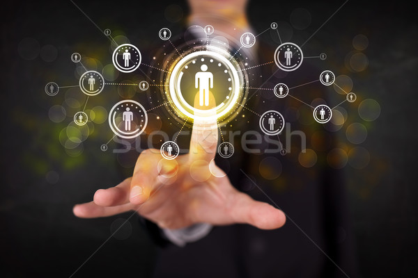 Modern businessman touching future technology social network but Stock photo © ra2studio