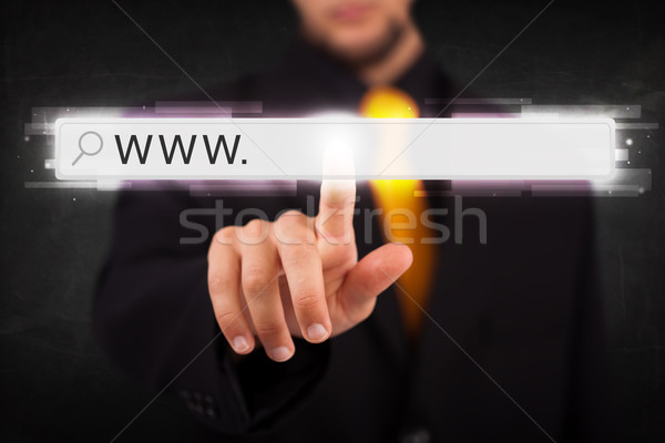 Tineri om de afaceri atingere web browser Imagine de stoc © ra2studio