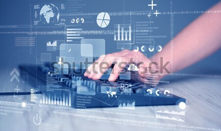 Keyboard buttons pressed by hand with high tech icons Stock photo © ra2studio