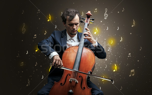 Stock photo: Falling notes with classical musician