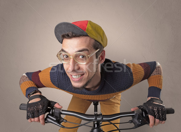 Crazy cyclist with empty background Stock photo © ra2studio