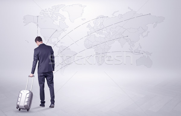 Businessman planning his trip over the world Stock photo © ra2studio