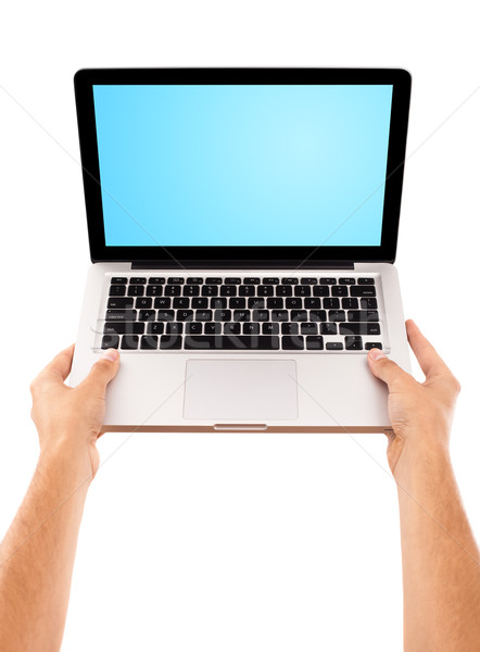 Stock photo: male hand holding laptop