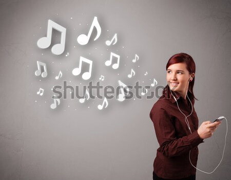 Güzel genç kadın şarkı söyleme müzik notaları dışarı Stok fotoğraf © ra2studio