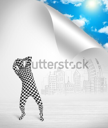 Man in body suit escaping from city to nature concept Stock photo © ra2studio