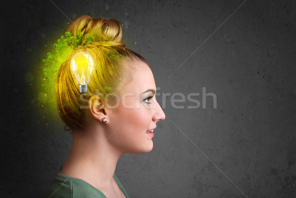 Young mind thinking of green eco energy with lightbulb Stock photo © ra2studio