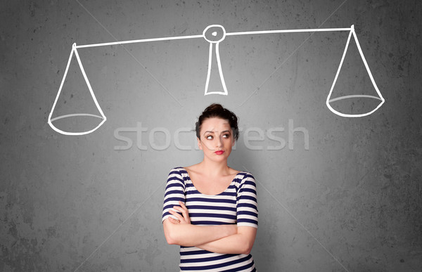 Young woman taking a decision Stock photo © ra2studio