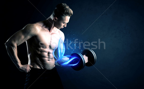 Montare atleta peso blu muscolare Foto d'archivio © ra2studio