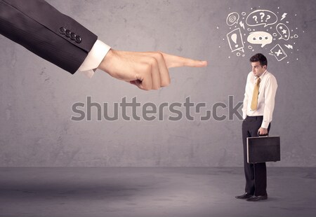 Boss hand pointing at confused employee Stock photo © ra2studio