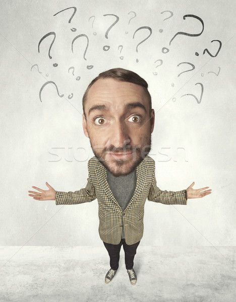 Big head person with question marks Stock photo © ra2studio