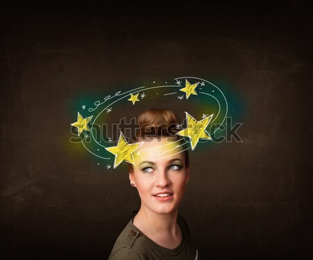 girl with yellow stars circleing around her head illustration Stock photo © ra2studio