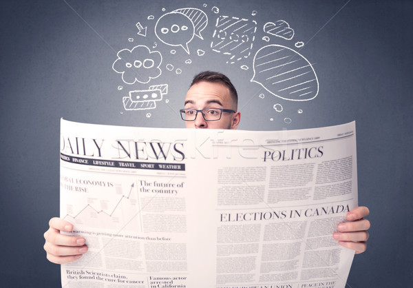 Businessman reading newspaper Stock photo © ra2studio