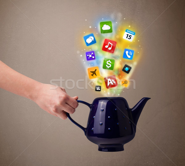 Tea pot with colorful media icons Stock photo © ra2studio
