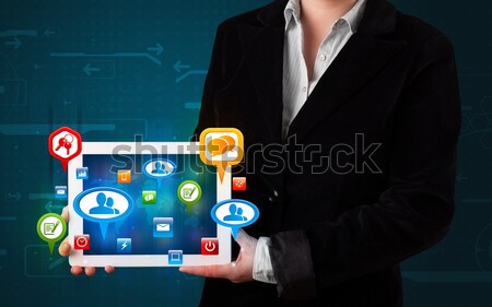 Lady holding tablet with modern software operational system Stock photo © ra2studio