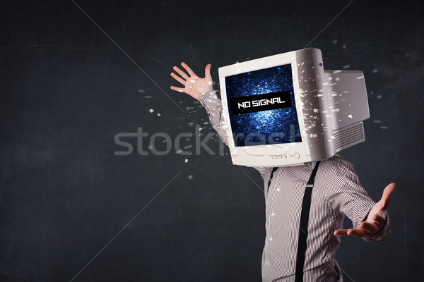 Man with a monitor head, no signal sign on the display Stock photo © ra2studio