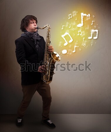 Stockfoto: Jonge · muzikant · spelen · saxofoon · muziek · merkt · aantrekkelijk