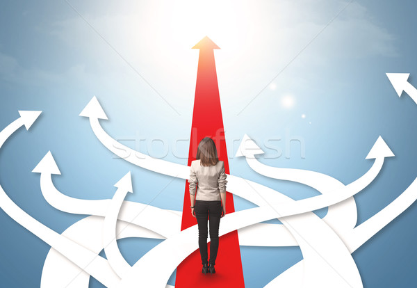 businesswoman with different direction arrows Stock photo © ra2studio