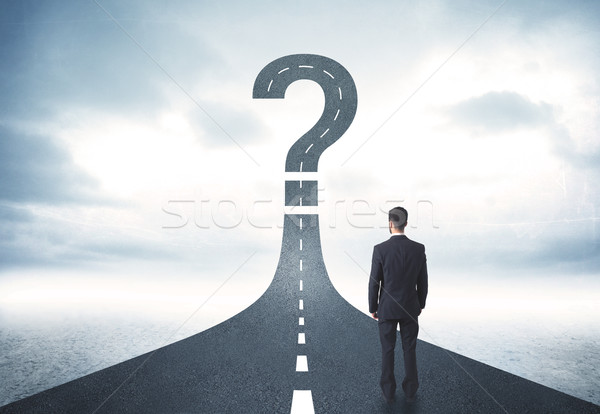 Business person lokking at road with question mark sign Stock photo © ra2studio