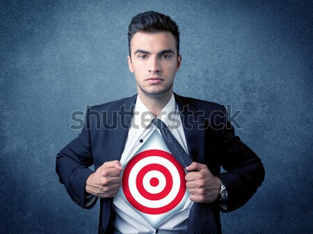 Businessman tearing shirt with target sign on his chest Stock photo © ra2studio