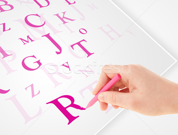 Stock photo: Hand writing various letters on white plain paper