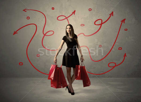 Stylish woman shopping and red arrows Stock photo © ra2studio