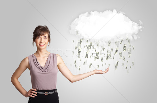 Woman with cloud and money rain concept Stock photo © ra2studio