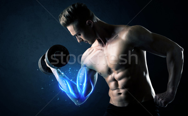 Fitt atléta emel súly kék izom Stock fotó © ra2studio