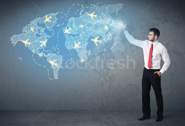 Business person showing digital map with planes around the world Stock photo © ra2studio