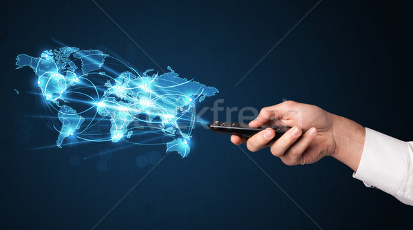 Hand with remote control, social media concept Stock photo © ra2studio