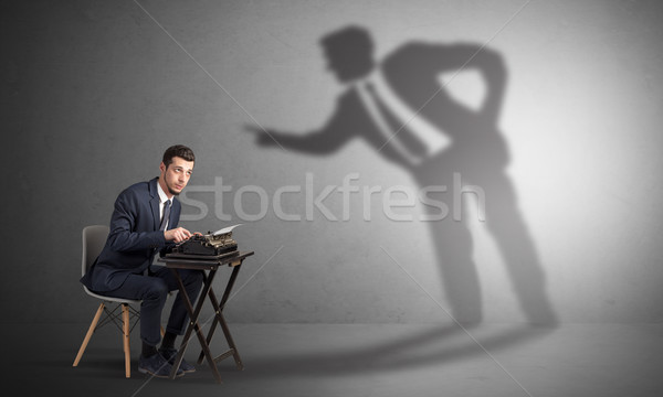 Man working hard and shadow arguing with him Stock photo © ra2studio