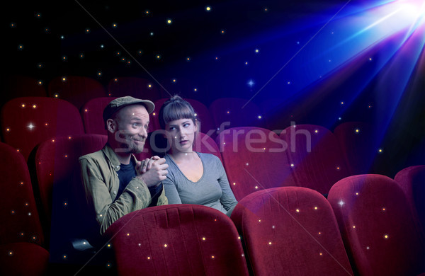 Lovely couple watching 3D movie Stock photo © ra2studio