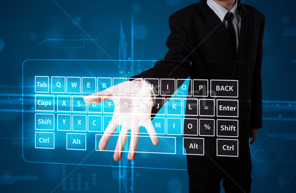 бизнесмен виртуальный тип клавиатура молодые Сток-фото © ra2studio