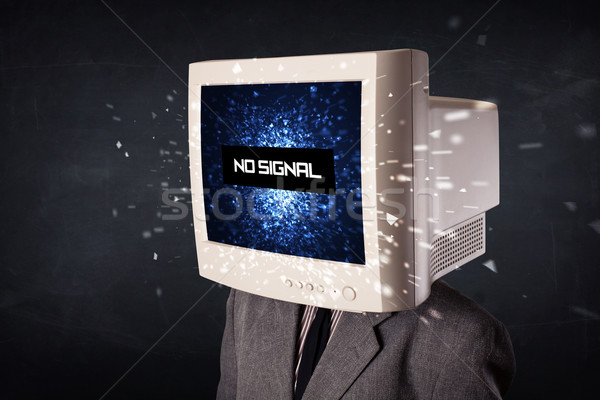 Man with a monitor head, no signal sign on the display Stock photo © ra2studio