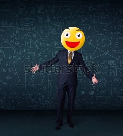 businessman wears yellow smiley face Stock photo © ra2studio