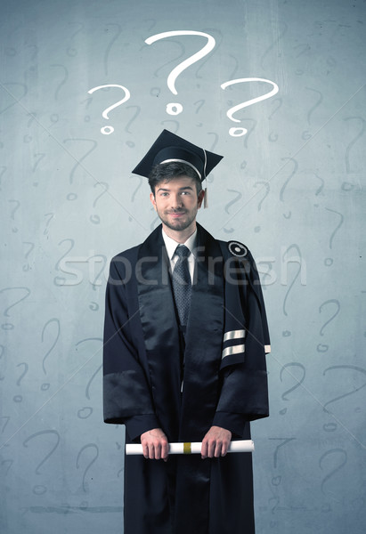 Jonge afgestudeerde tiener vraagtekens hoofd Stockfoto © ra2studio