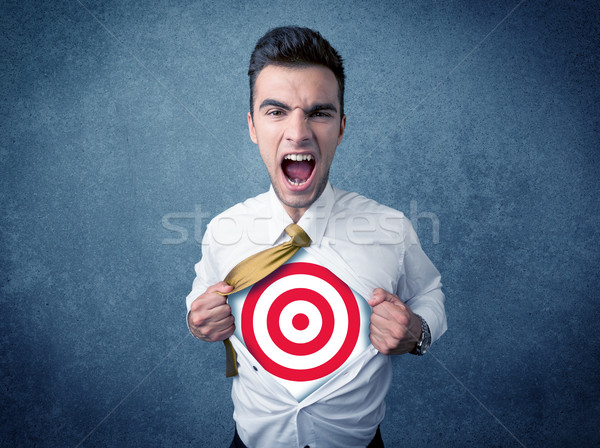 Stock photo: Businessman tearing shirt with target sign on his chest