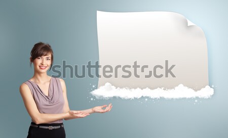 pretty woman presenting modern copy space on clouds Stock photo © ra2studio
