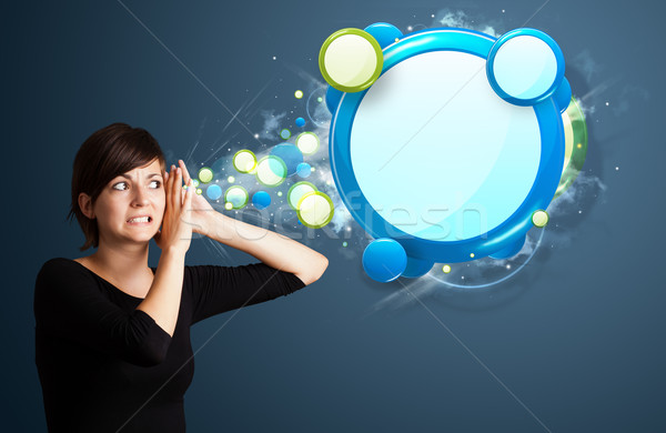 Young woman with abstract modern speech bubble Stock photo © ra2studio