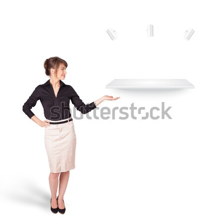 Beutiful young woman presenting modern copy space Stock photo © ra2studio