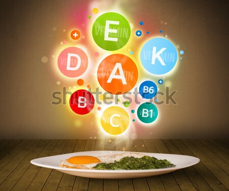 Stock photo: Food plate with delicious meal and healthy vitamin symbols