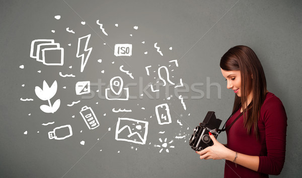 Stock photo: Photographer girl capturing white photography icons and symbols