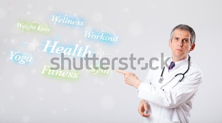 клинический врач указывая здоровья фитнес коллекция Сток-фото © ra2studio