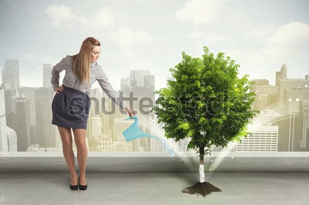 Businesswoman standing on the edge of rooftop Stock photo © ra2studio