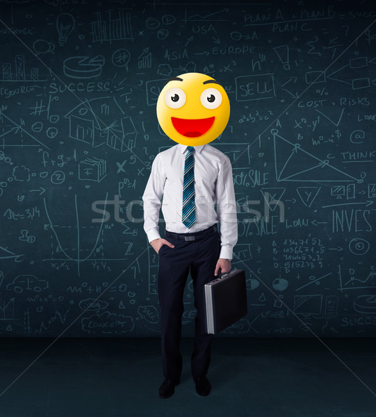 businessman wears yellow smiley face Stock photo © ra2studio