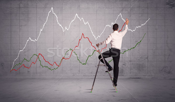 male on ladder drawing chart lines Stock photo © ra2studio