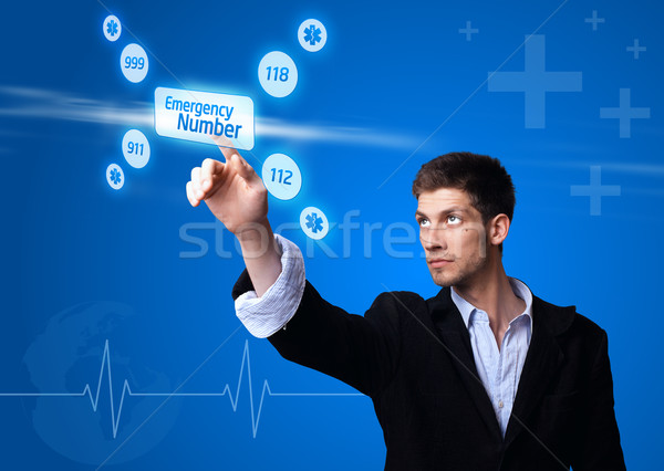  doctor pressing digital button Stock photo © ra2studio