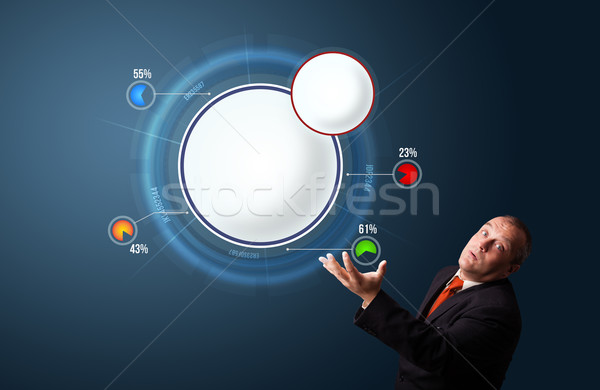 funny businessman in suit presenting abstract modern pie chart Stock photo © ra2studio