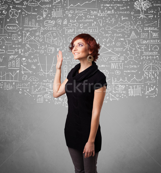 Young pretty lady with hand drawn calculations and icons Stock photo © ra2studio