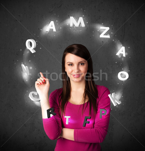 Young woman thinking with letter circulation around her head Stock photo © ra2studio