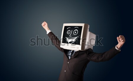 Happy businessman with a PC monitor head and a smiley face Stock photo © ra2studio